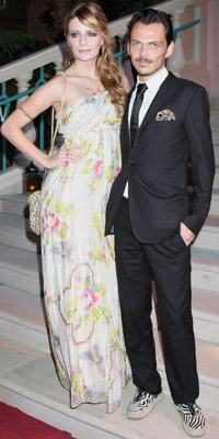 Actress Mischa Barton and designer Matthew Williamson   Photograph by: Getty Images/Atlantis, The Palm