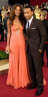 John Legend (right) and guest attend the 81st Annual Academy Awards®  Dress by:  Jon Didier / ©A.M.P.A.S.